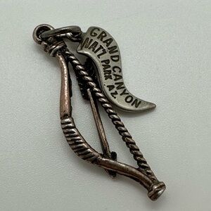 Grand Canyon bow and arrow silver tone charm